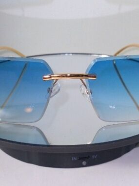 Rimless Blue Gradient Lens Sunglasses with Gold Bridge